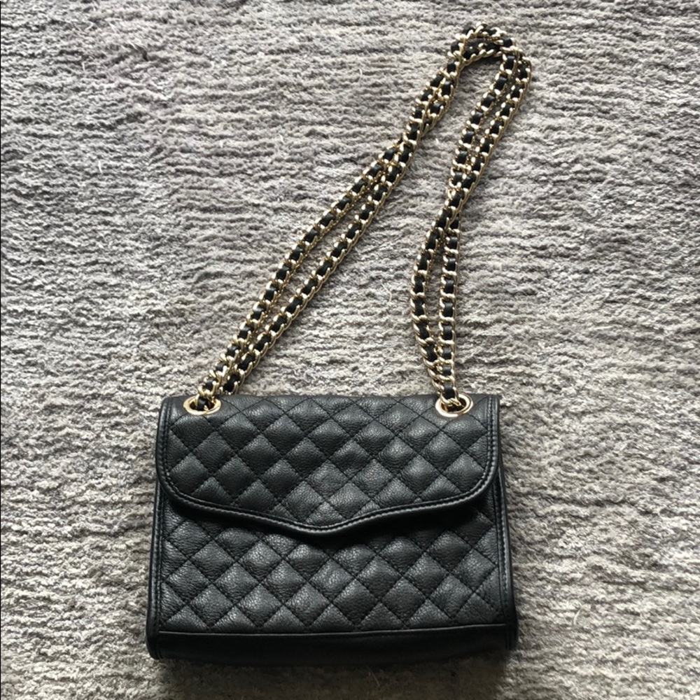 Black leather crossbody with gold chain